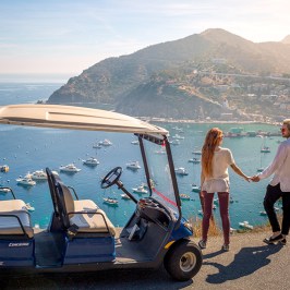 a man standing in front of a mountain