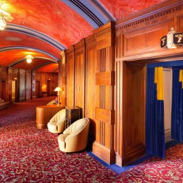 a room filled with furniture and a rug