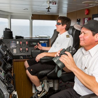 a man sitting on a motorcycle