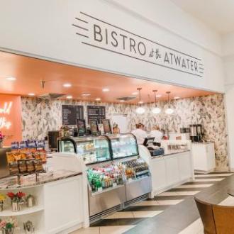 a kitchen with a table in a restaurant