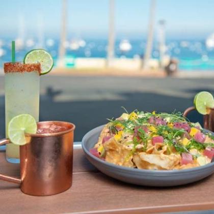 a plate of food and a cup of water