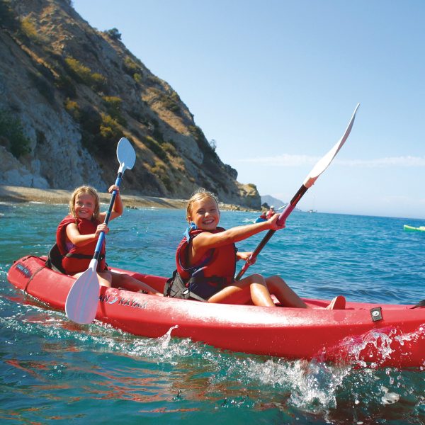 Two girls kayaking in Catalina Island.