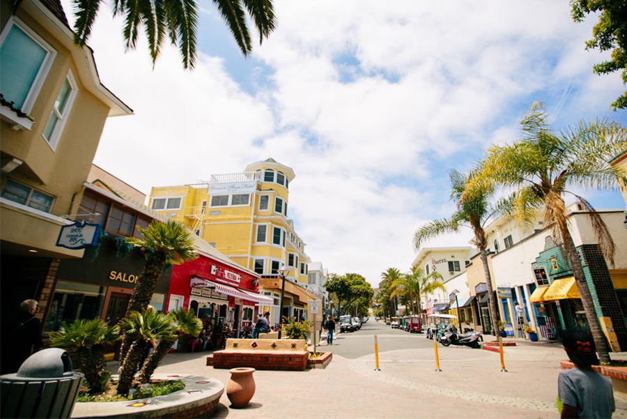 a group of people sitting at a bus stop