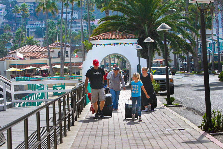 blog-2018_packing-list a group of people on a sidewalk