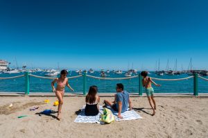 A family spending time on the beach on Catalina Island.
