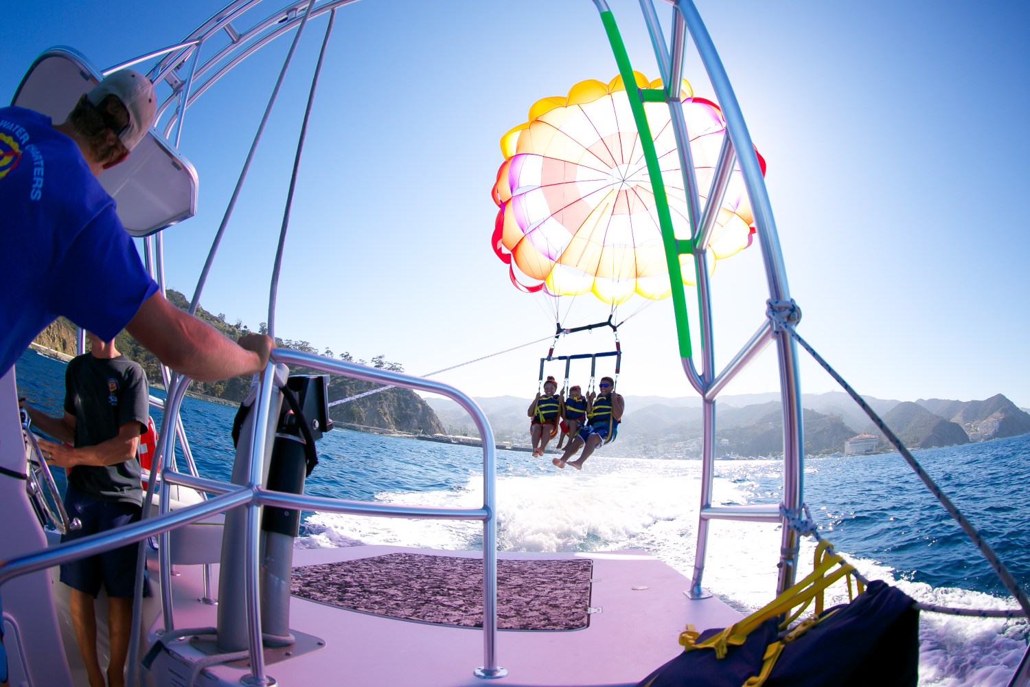 A group of people parasailing on Catalina Island. 