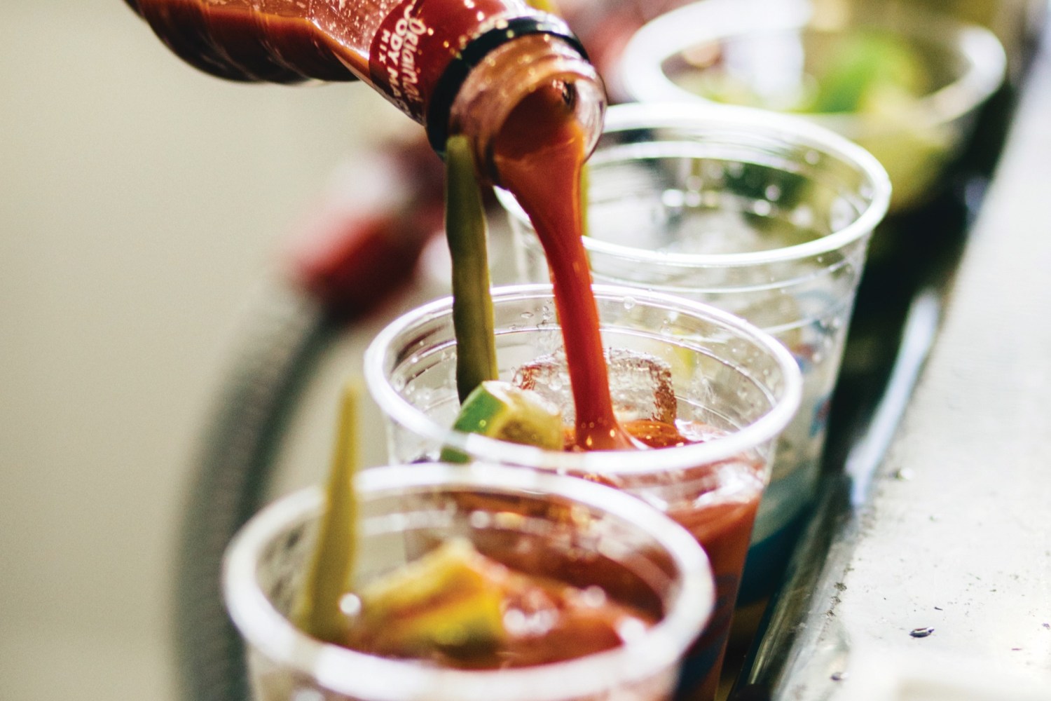 An employee making a famous Catalina Express Bloody Mary.