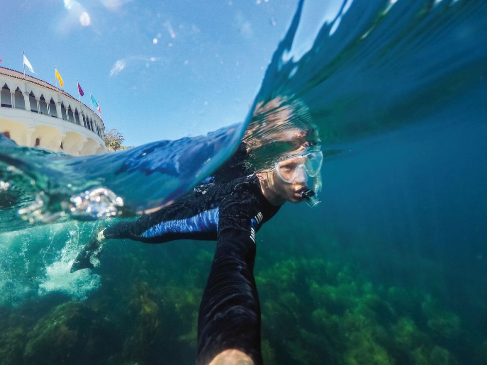 A boy snorkeling in Avalon on Catalina Island. 