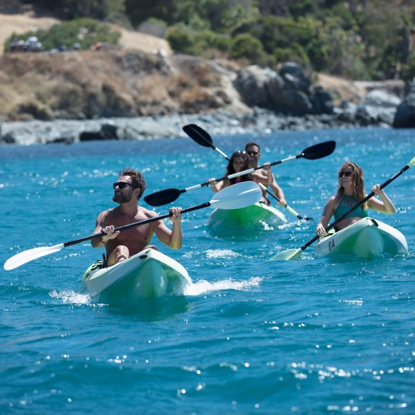 A group of friends kayaking in Two Harbors.