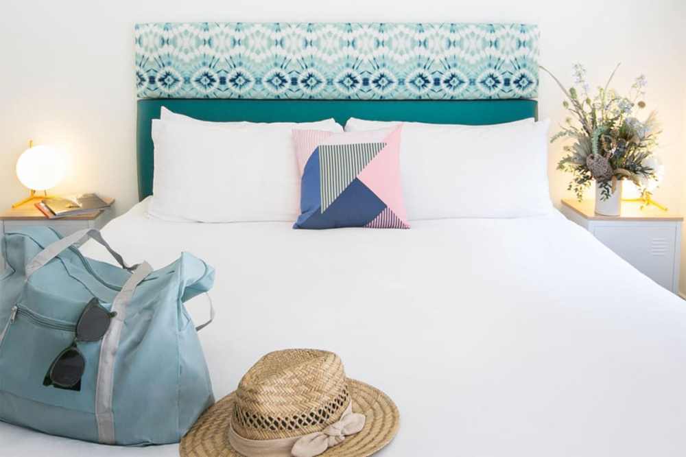 A picture of a room at the Bellanca Hotel.