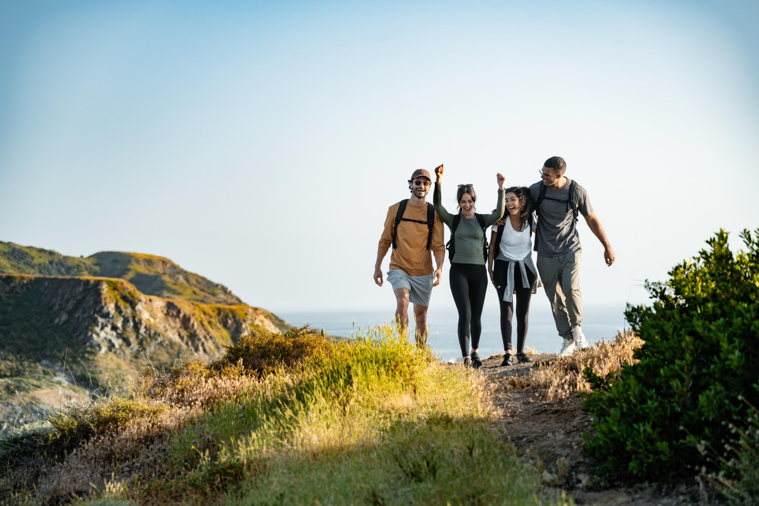 A group of friends hiking in Two Harbors on Catalina Island.